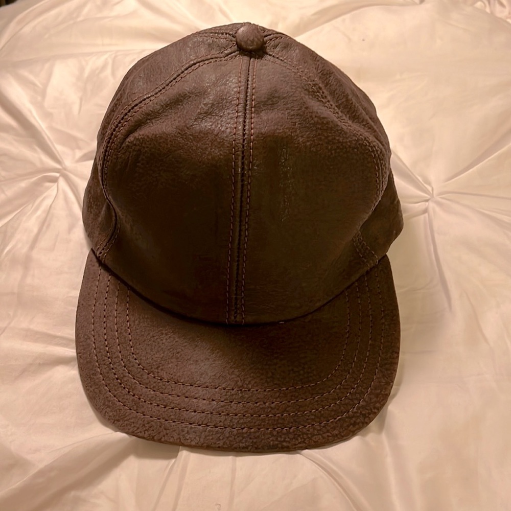 All leather brown cap.  Unisex